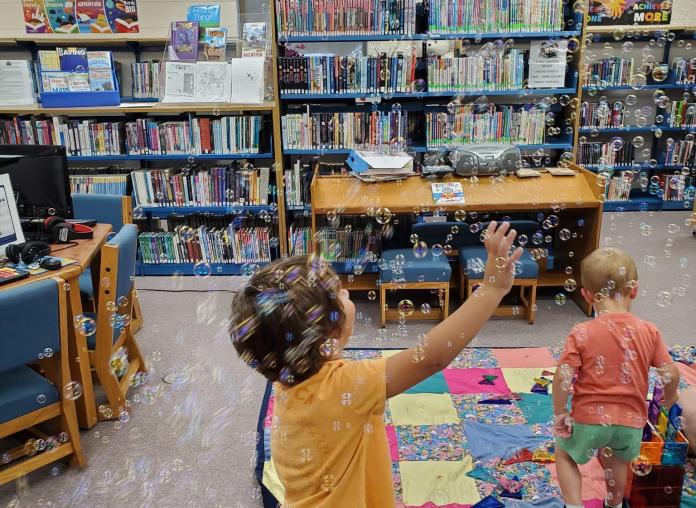 Kids playing the Library